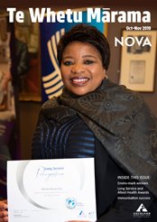 A woman holding a certificate