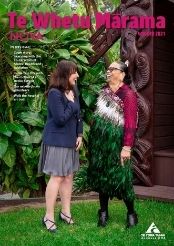 Two women outside a whāre